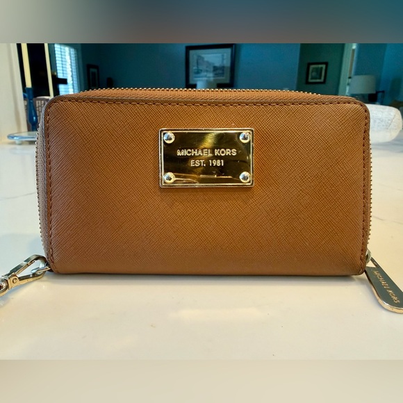 Michael Kors Handbags - Michael Kors Brown Leather Jet Set Zip Around Wristlet Wallet
